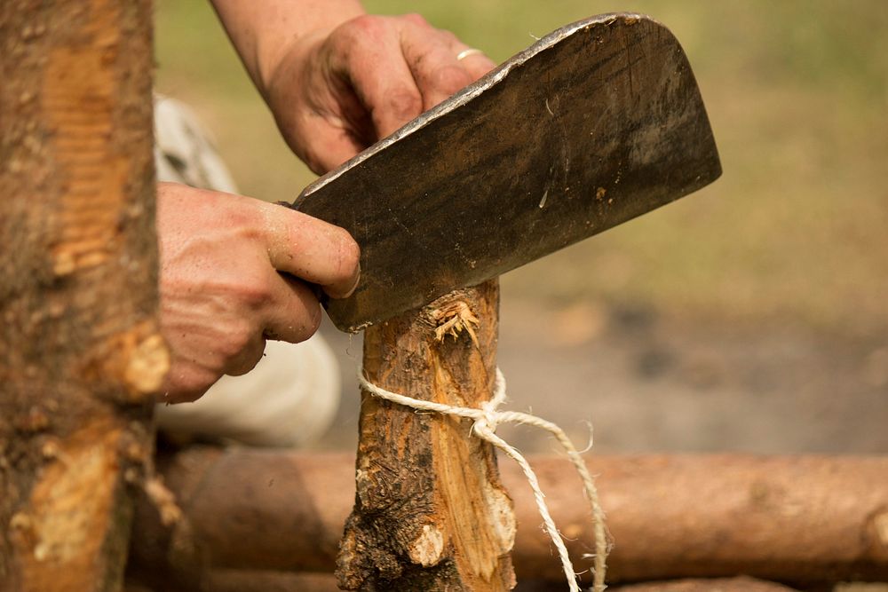 Knife cutting through wood. Free public domain CC0 photo.