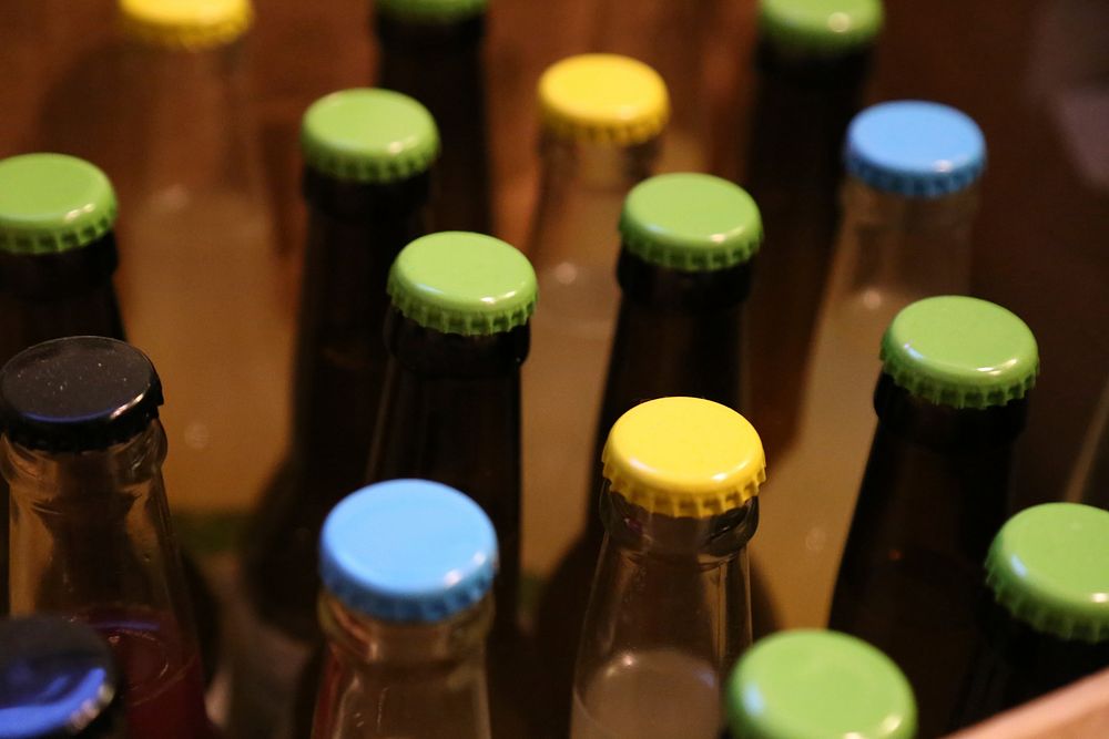 Rows of glass beer bottles. Free public domain CC0 photo