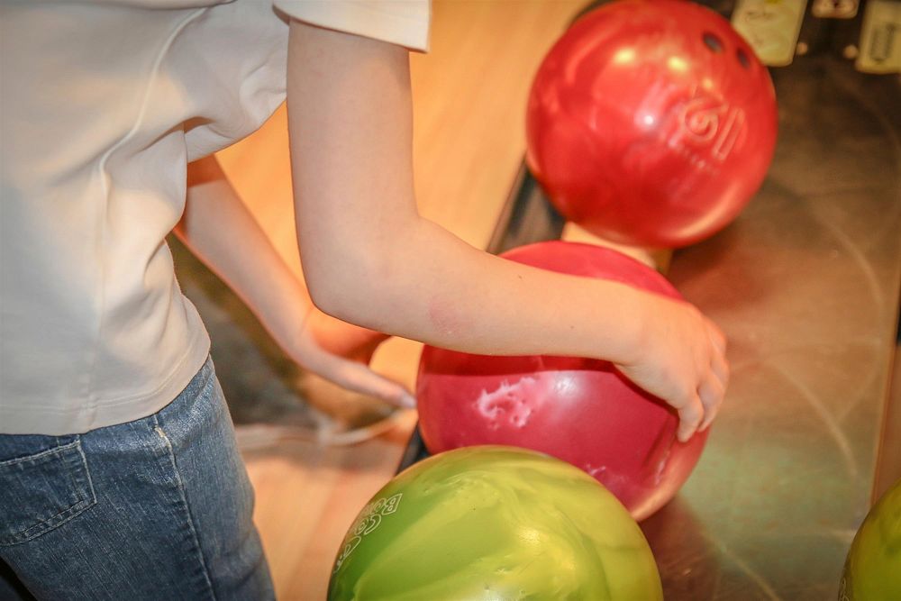 Fun at the bowling alley. Free public domain CC0 photo.