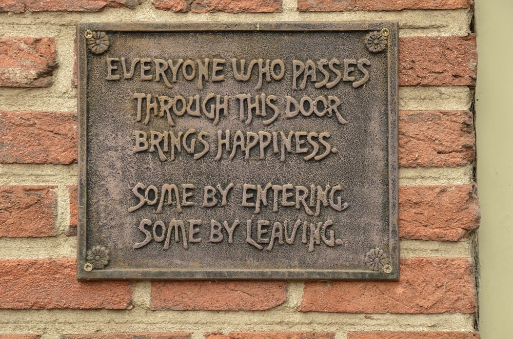 Vintage sign on brick wall. Free public domain CC0 image.