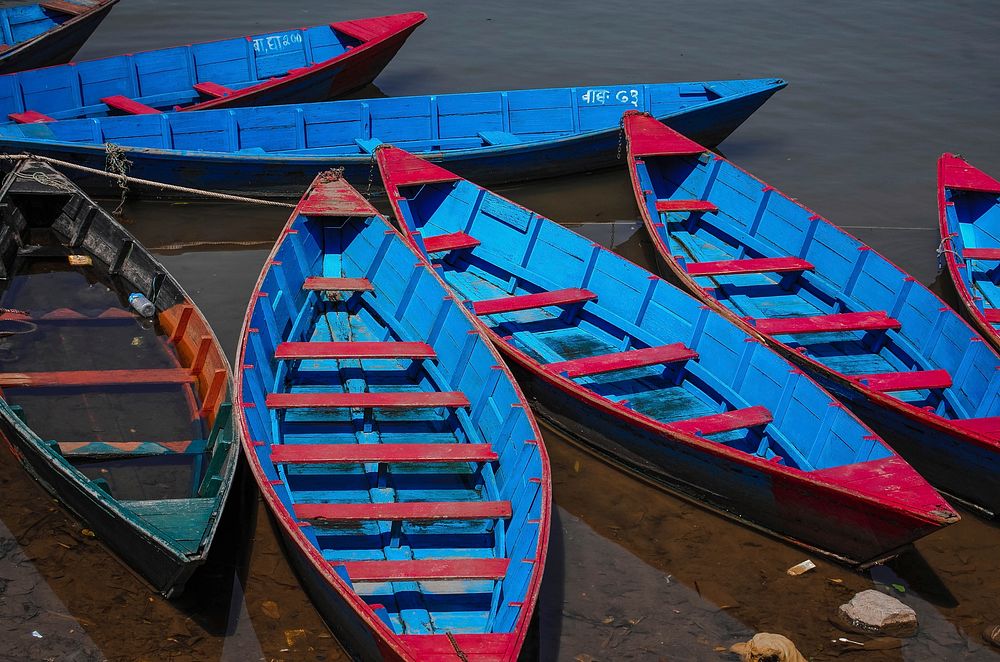 Blue wooden fishing boats. Free public domain CC0 photo.