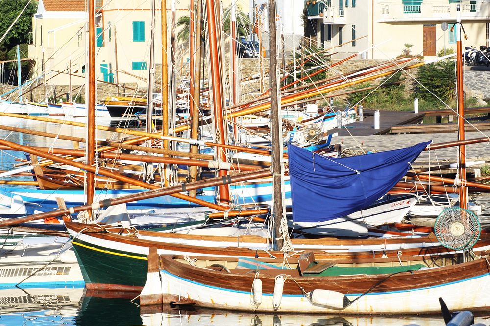Boat docked by the port. Free public domain CC0 photo.
