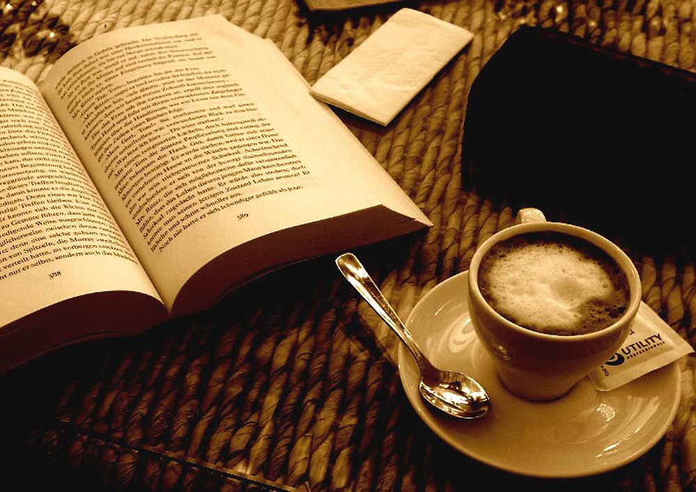 Coffee, crema, and book. Free public domain CC0 image