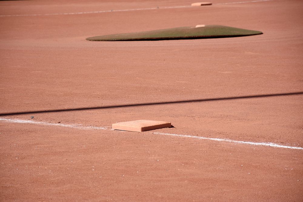 Closeup on baseball base. Free public domain CC0 image. 