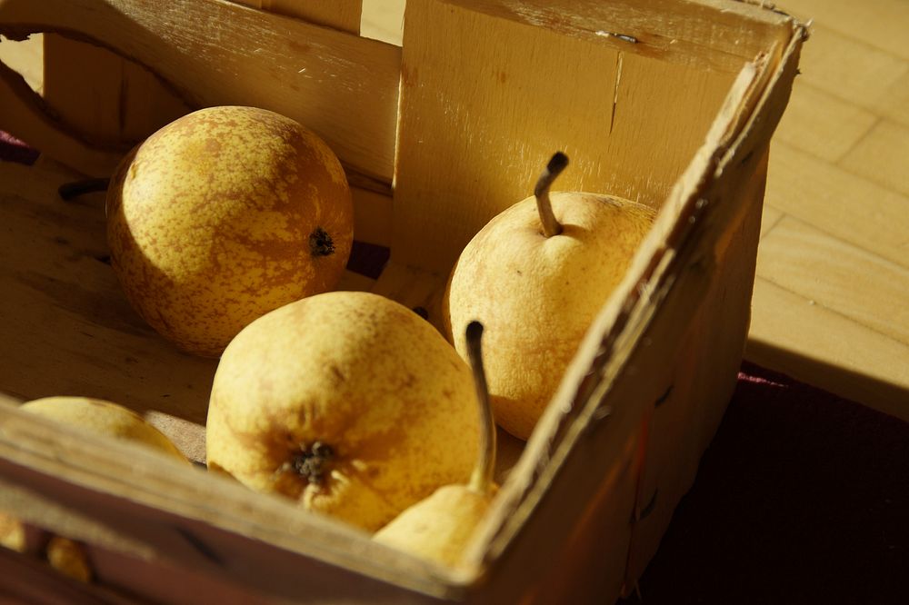 Pear fruit in cardboard box. Free public domain CC0 photo.