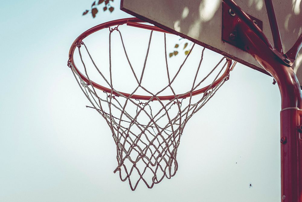 Closeup on an outdoor basketball hoop. Free public domain CC0 photo.