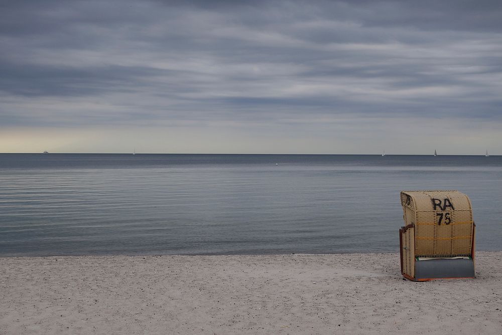 Beach chair & silent sea. Free public domain CC0 photo.