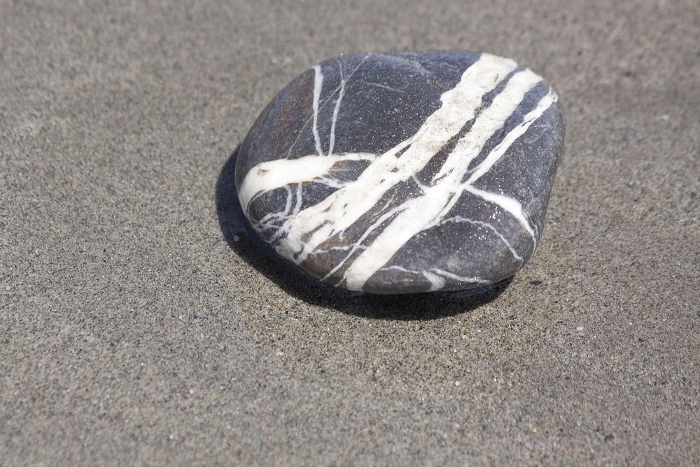 Stones on beach. Free public domain CC0 image.