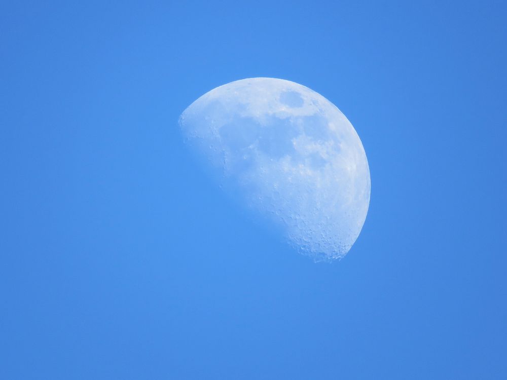 Waning moon in dark sky. Free public domain CC0 image.