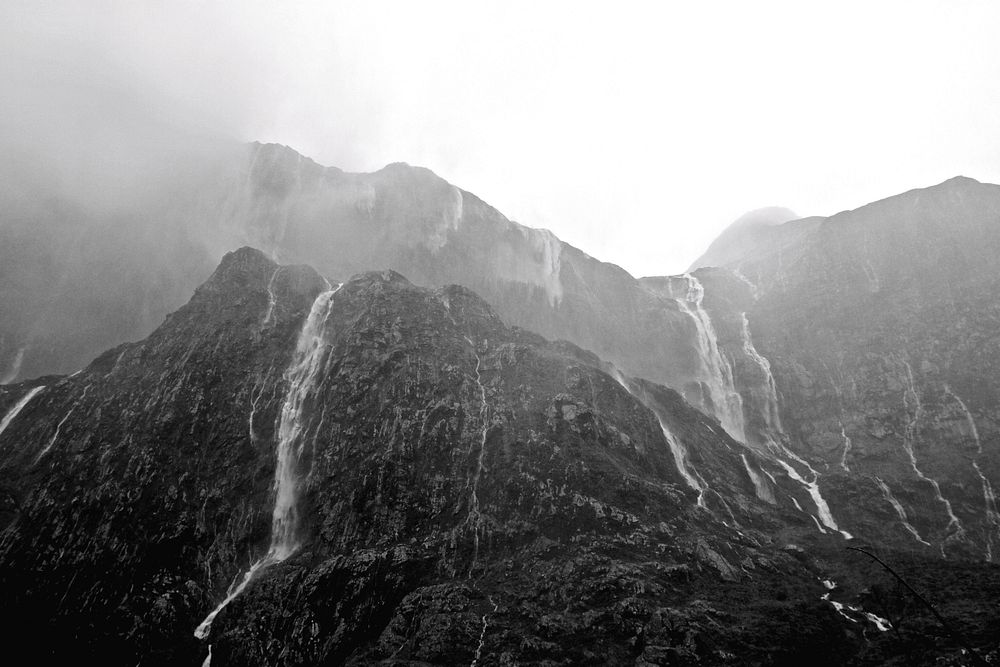 Foggy waterfall mountain. Free public domain CC0 image.