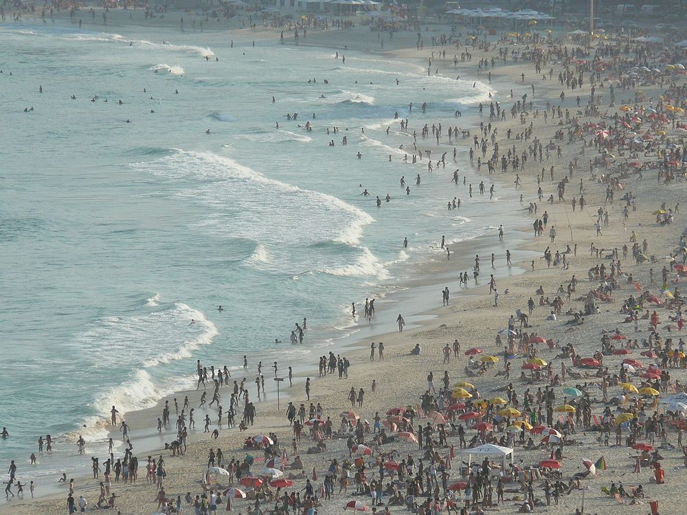 Crowd on beach. Free public domain CC0 image.