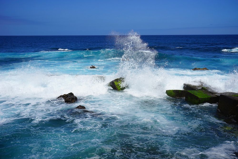 Sea waves against the rocks. Free public domain CC0 photo.