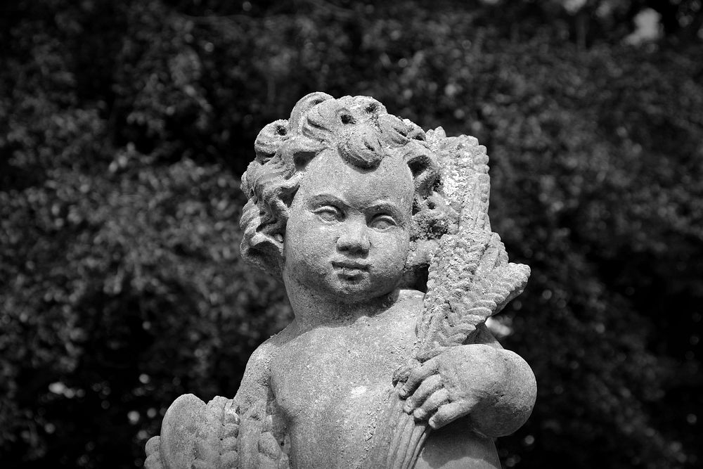 Cherubim statue. Free public domain CC0 photo.