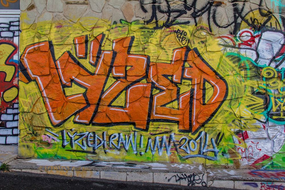 Script graffiti wall, street art. Free public domain CC0 image.