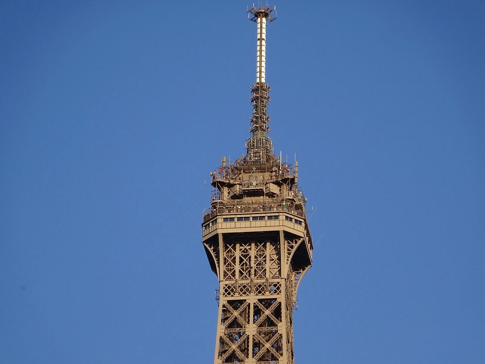 Eiffel tower top, Paris, France. Free public domain CC0 image.