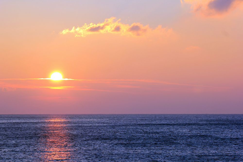Sunrise over the sea. Free public domain CC0 photo.