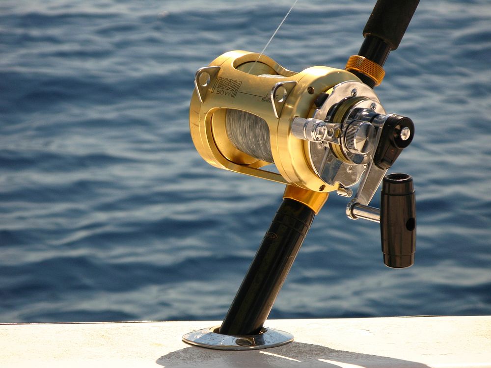 Yellow fishing rod close up. Free public domain CC0 photo.