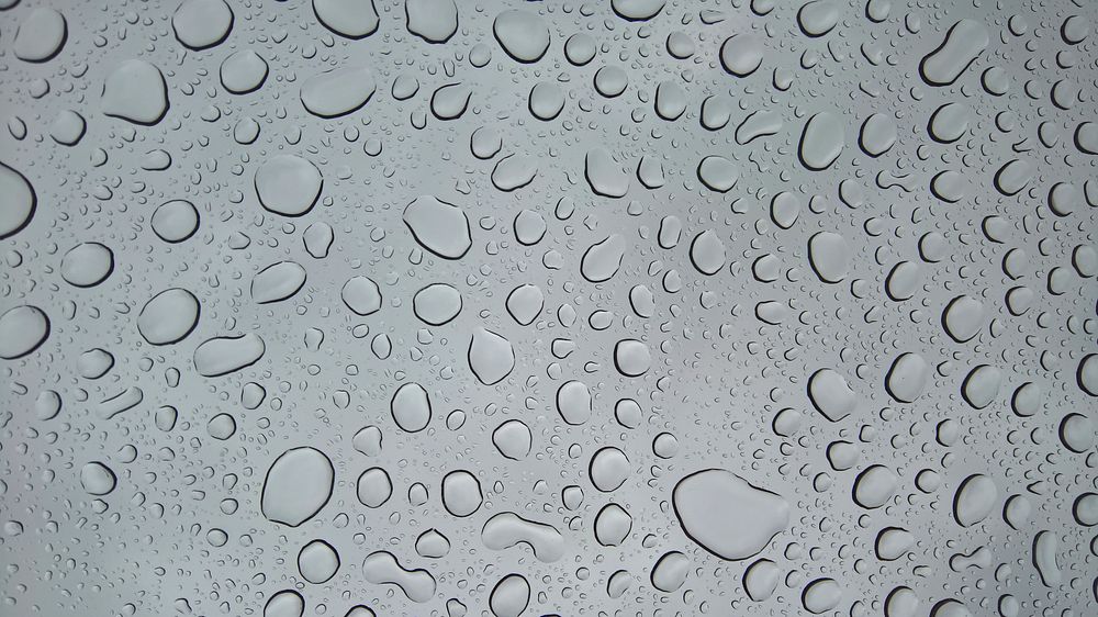 Raindrop on window texture. Free public domain CC0 photo.