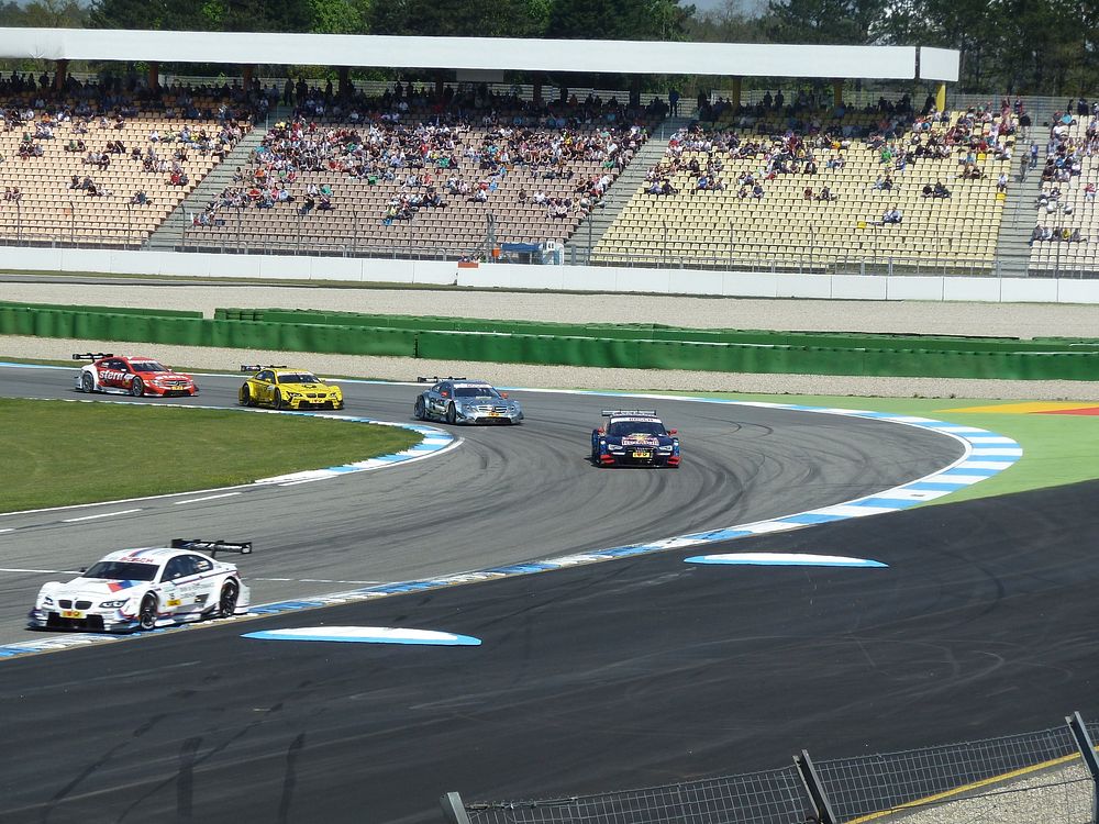 Sports cars racing on the track. Free public domain CC0 photo.