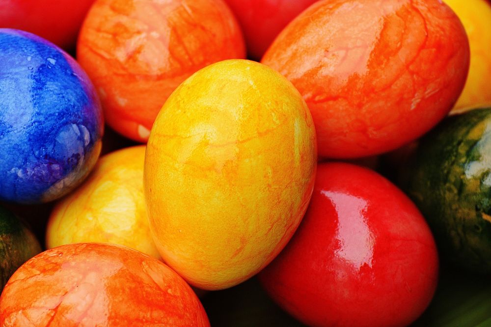 Closeup on pile of colorful Easter eggs. Free public domain CC0 photo. 