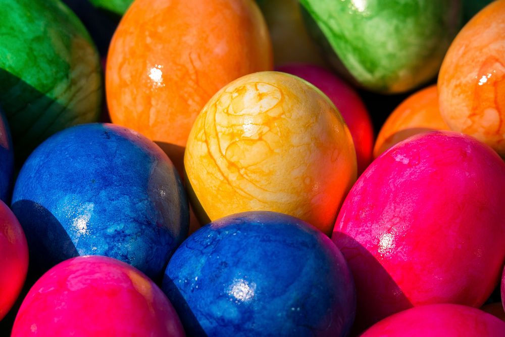 Closeup on pile of colorful Easter eggs. Free public domain CC0 photo. 
