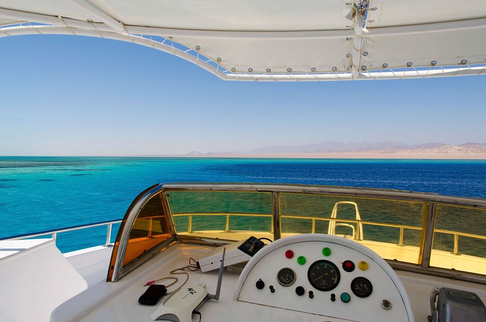 Free yacht control panel and red sea image, public domain vacation CC0 photo.