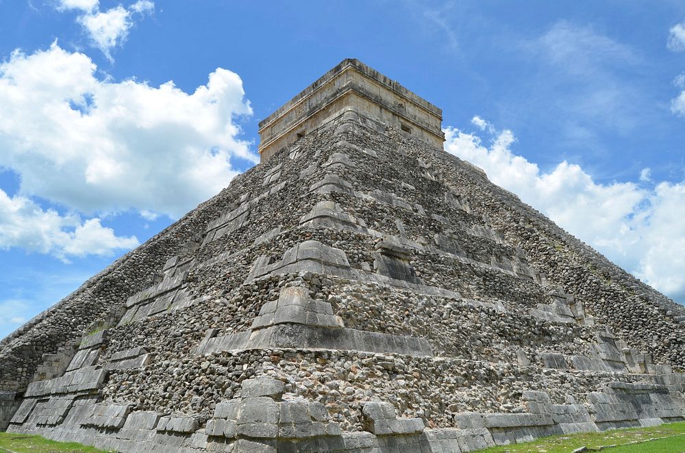 Low angle view of Mayan pyramid with blue sky in Mexico. Free public domain CC0 photo.