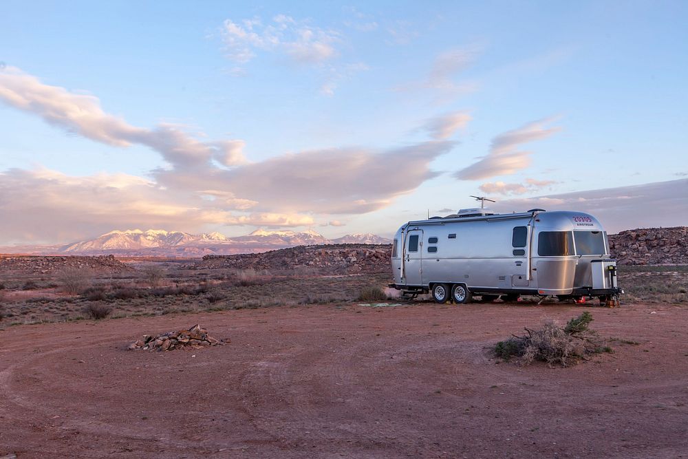 Free camper van on desert photo, public domain travel CC0 image.