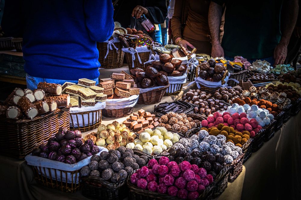 Chocolate truffles and bar at a farmer's market. Free public domain CC0 photo.