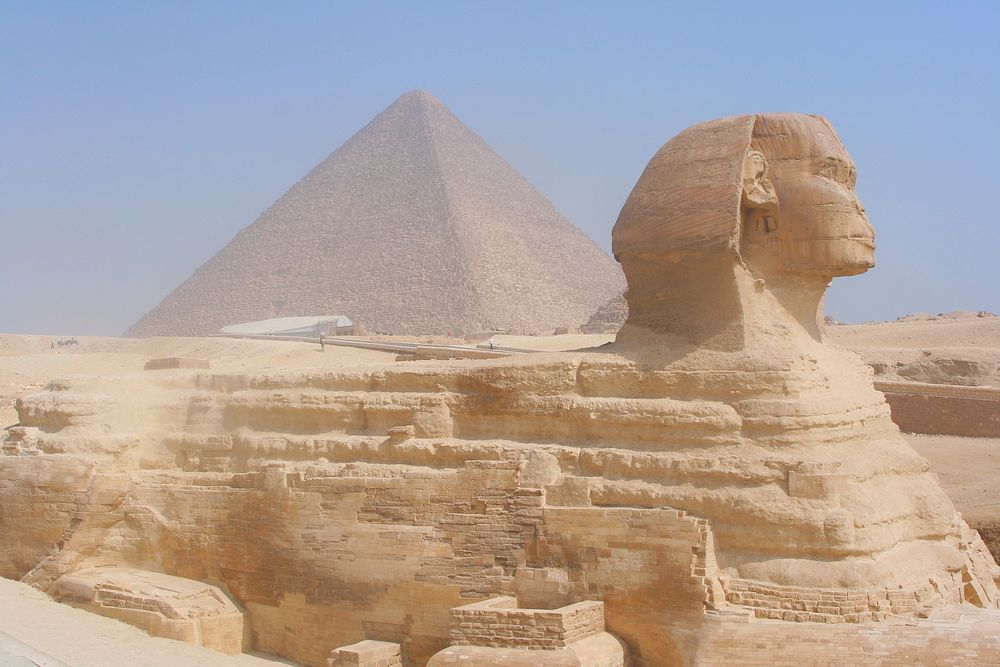 Sphinx in front of Pyramid. Free public domain CC0 photo.