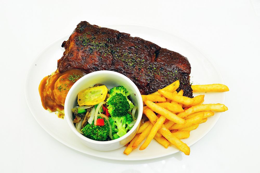 Steak with salad & French fries. Free public domain CC0 image
