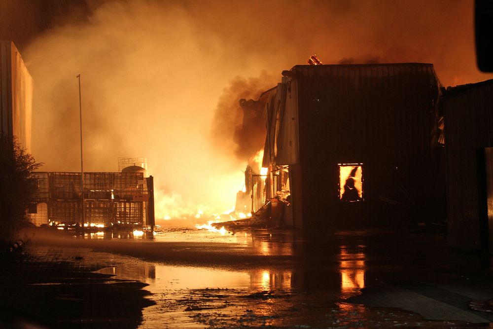 Buildings on fire. Free public domain CC0 photo.