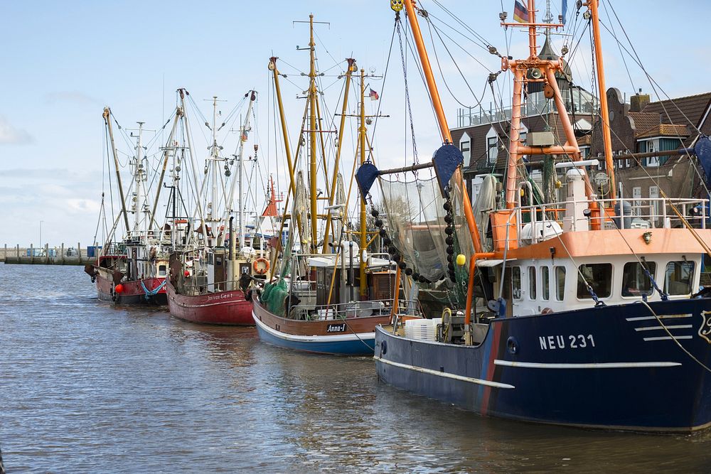 Fishing boat at dock. Free public domain CC0 photo.