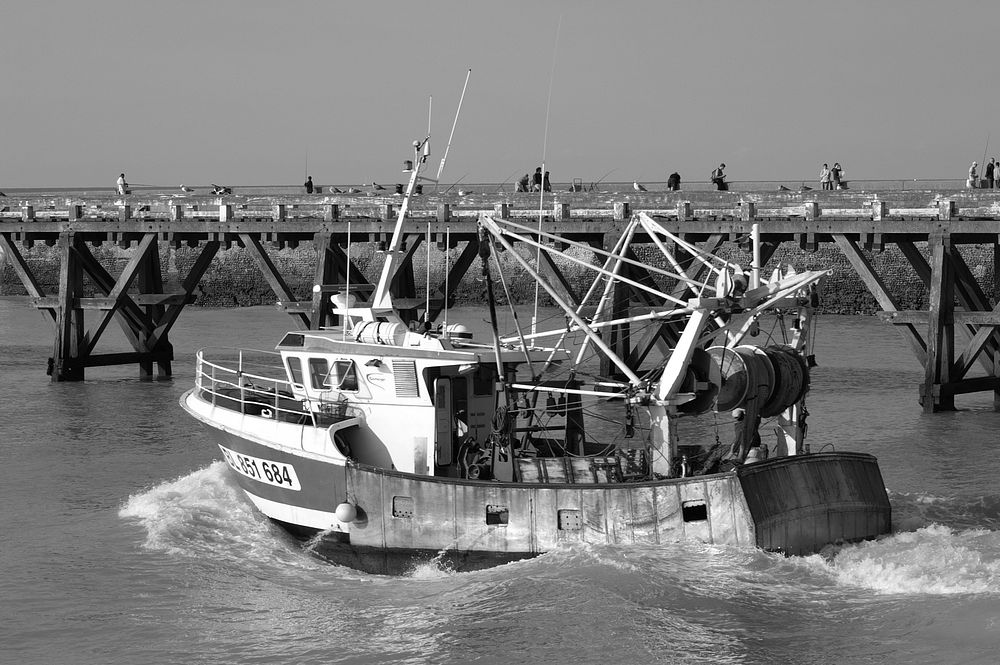 Old fishing boat sailing. Free public domain CC0 photo.