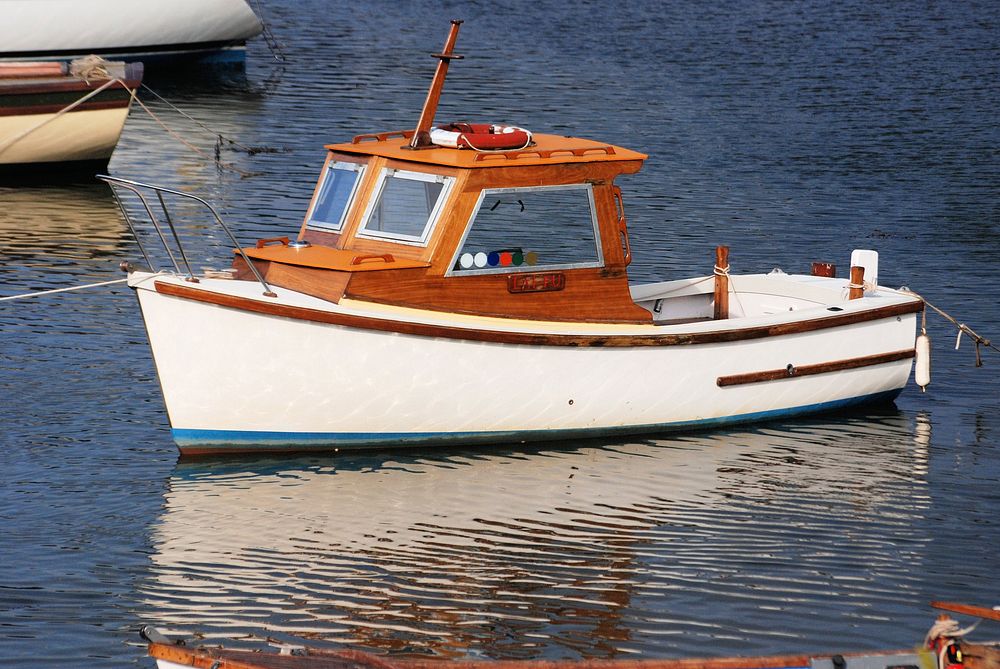 Wooden white fishing boat. Free public domain CC0 photo.