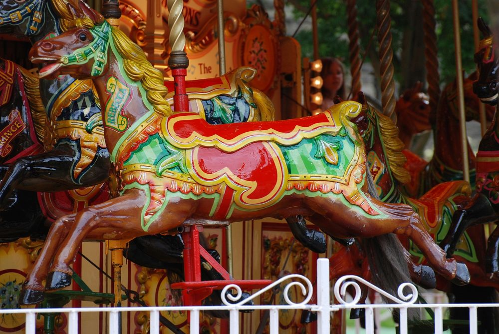 Horse carousel, amusement park. Free public domain CC0 photo.