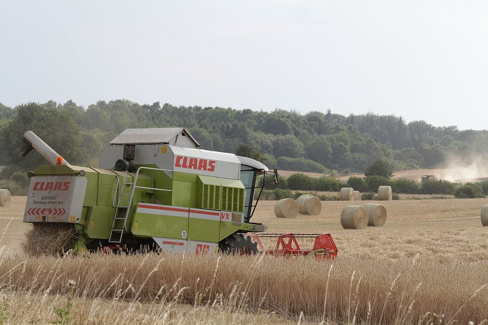 A CLAAS combine harvester working in a wheat field, location unknown, January 10, 2015. View public domain image source here