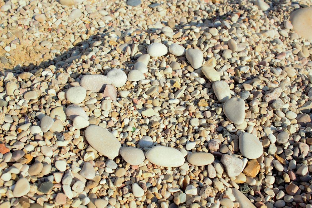 Heart stones on beach. Free public domain CC0 image.