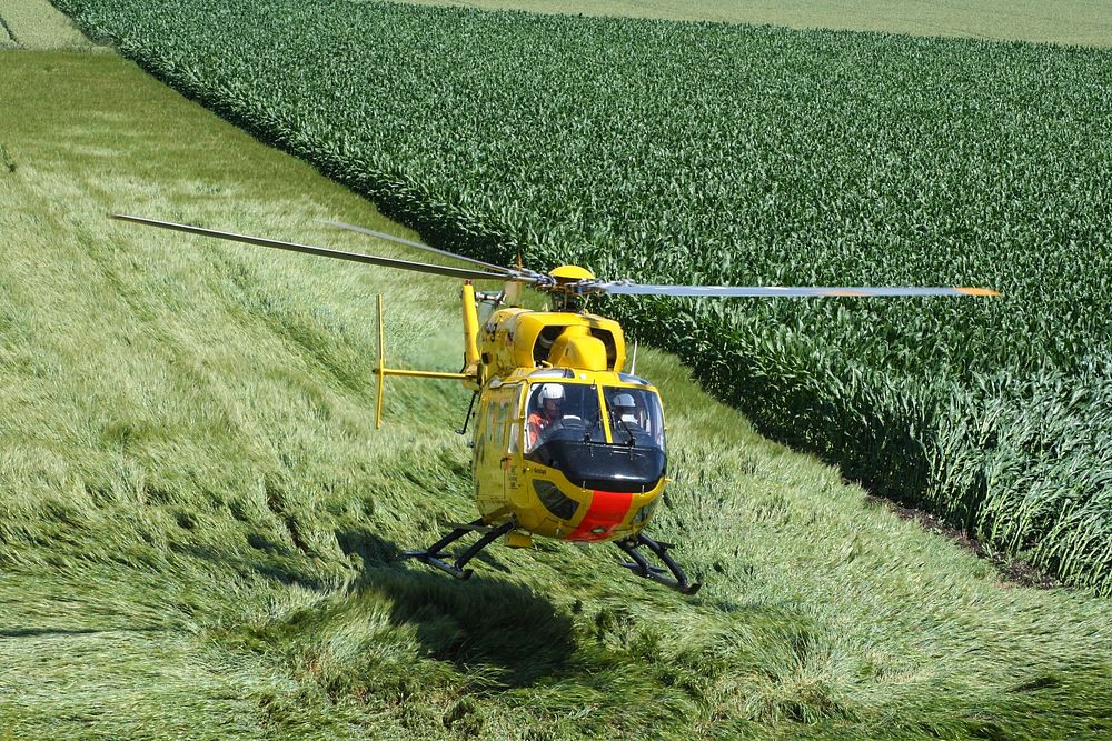 Helicopter landing. Free public domain CC0 photo.