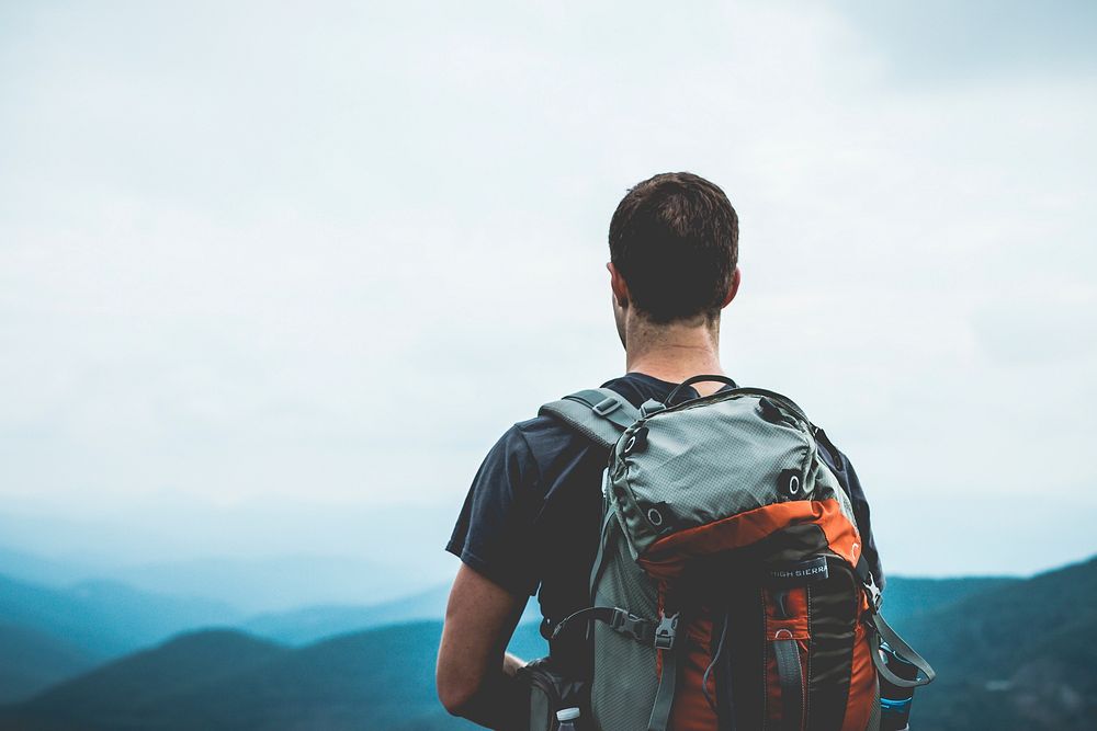 Backpacker on an adventure. Free public domain CC0 photo.