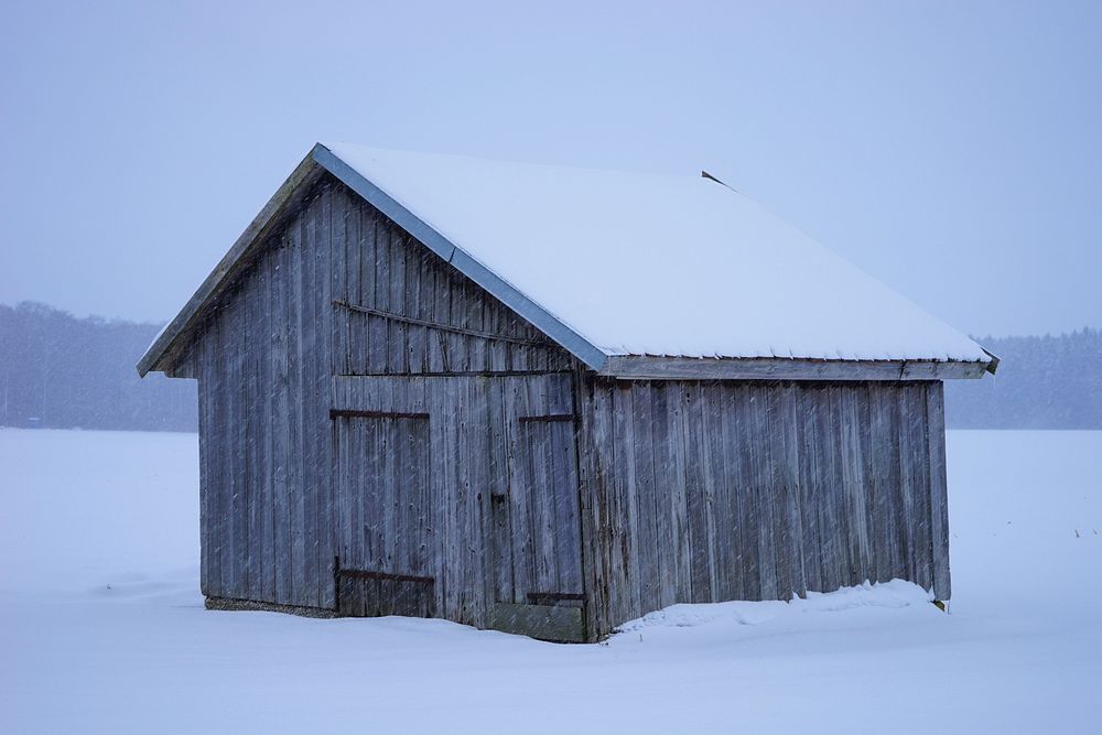 Abandoned house covered in snow during winter. Free public domain CC0 image. 