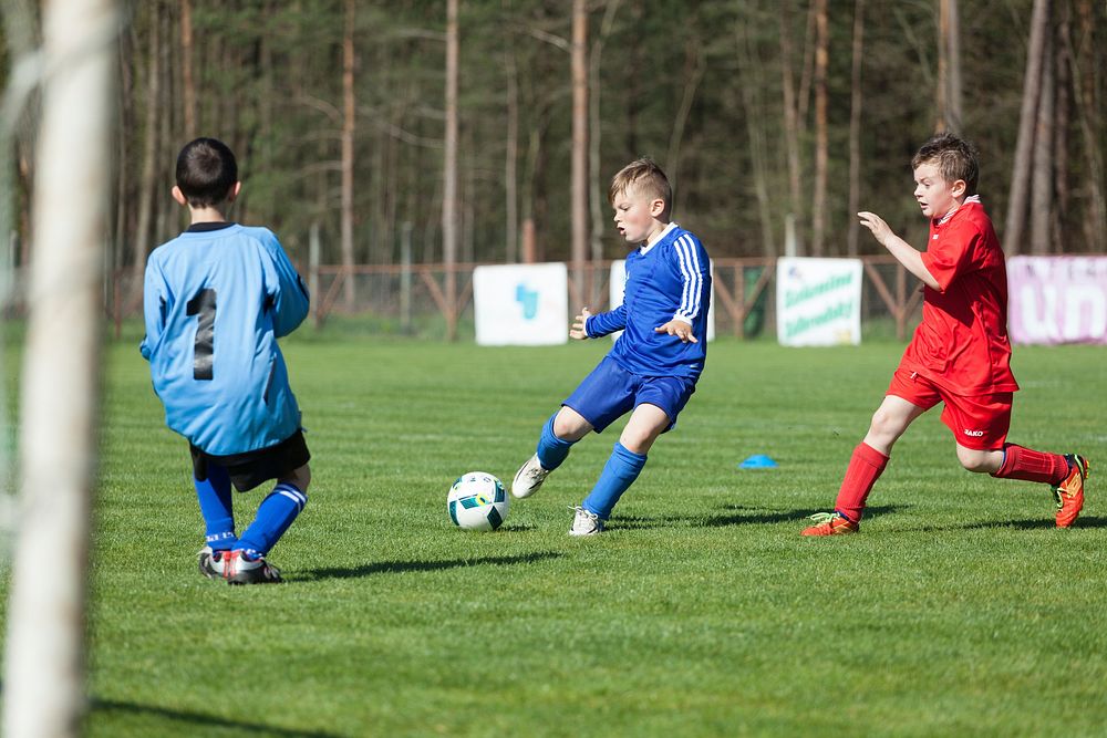 Kids playing in football tournament, 7 May 2016, Albrechtice, Czech Republic. View public domain image source here