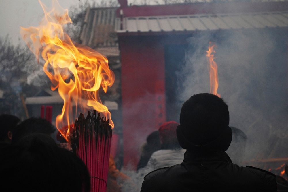 Incense ceremony in temple. Free public domain CC0 image.