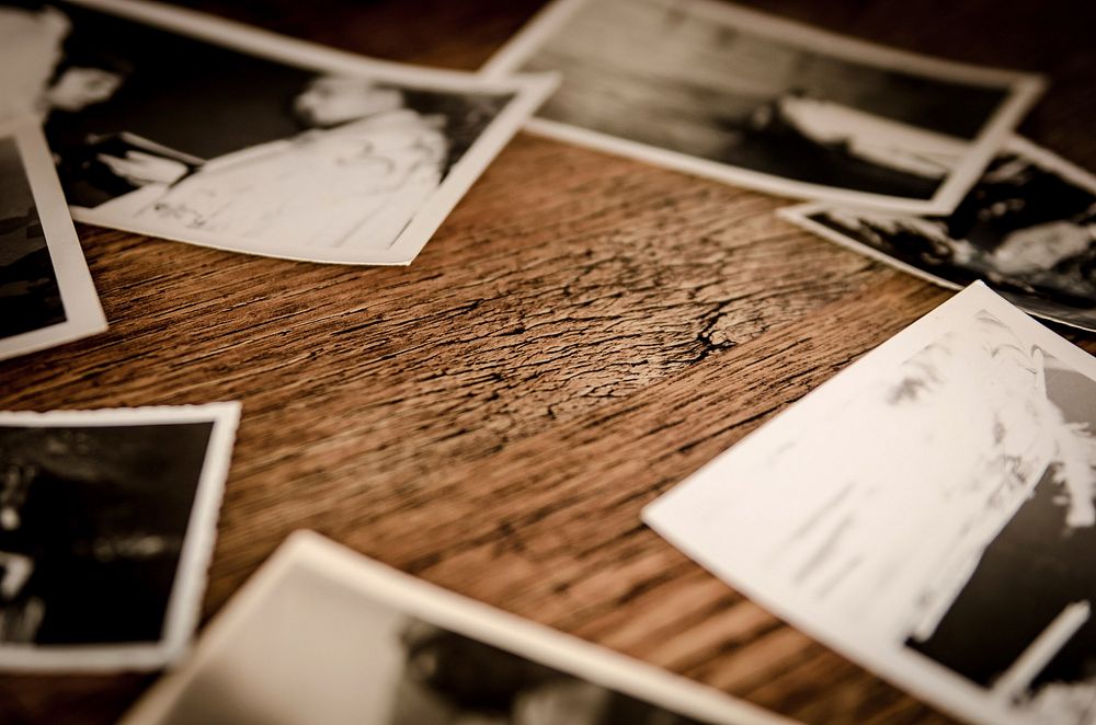 Photographs on the table. Free public domain CC0 photo.