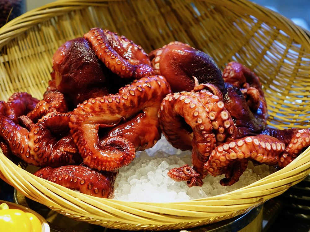 Octopus in wooden basket. Free public domain CC0 photo.