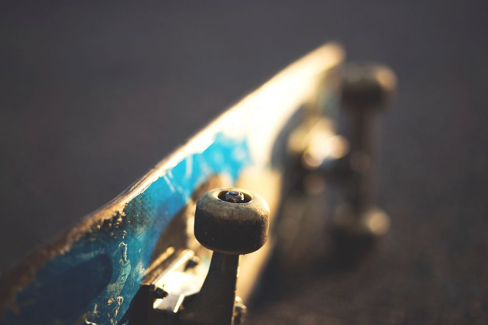 Closeup on skateboard laying on side. Free public domain CC0 photo.