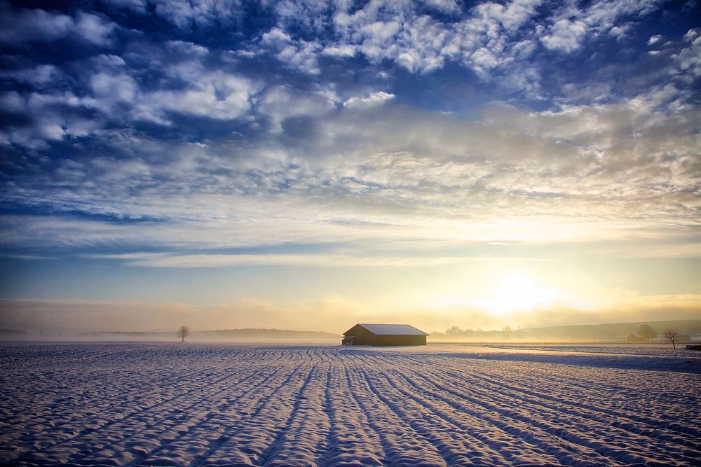 Beautiful sunrise over field during winter. Free public domain CC0 image.