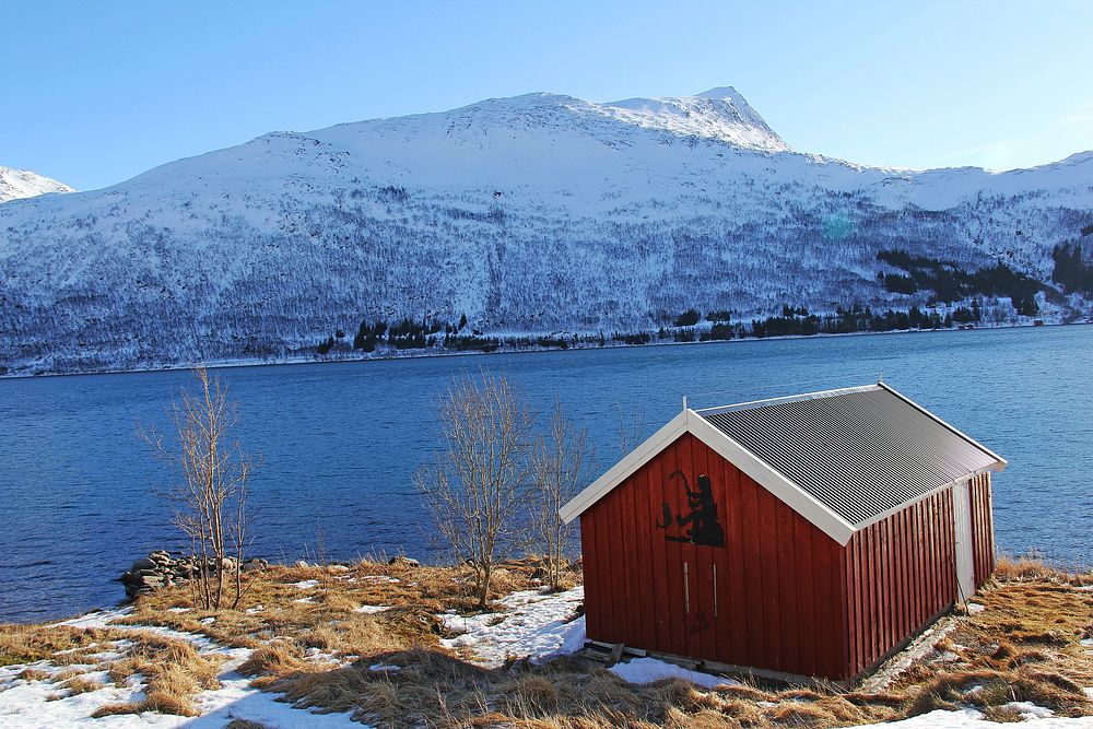 Nordic house near snow mountain. Free public domain CC0 photo.