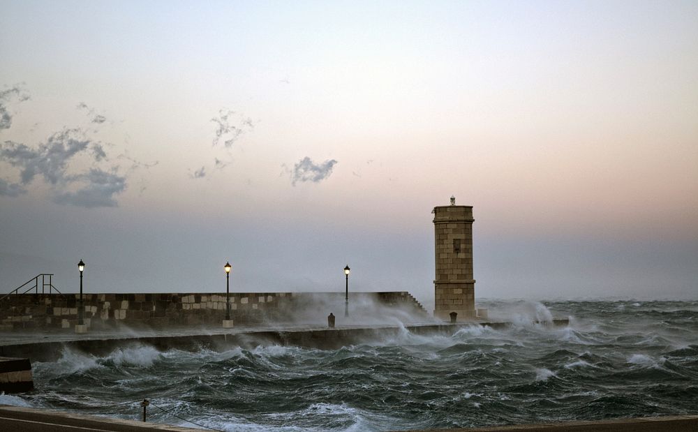 Storm near the lighthouse. Free public domain CC0 image.