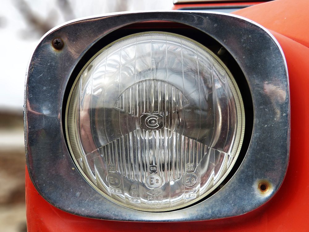 Car headlight closeup. Free public domain CC0 image.